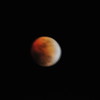 SmugMug > keywords > eclipse > I didn't realize how dim the moon was going to be under the blood-red shadow from the earth!  Here, I'm at almost 3/4 of a second, and it was impossible to get a steady shot.  Oh well.